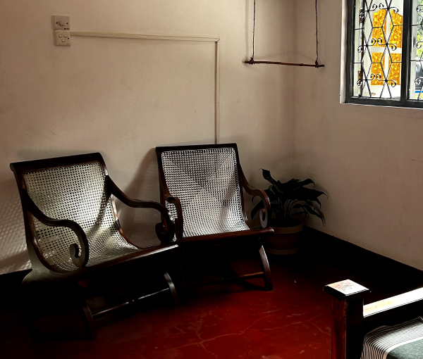 Sri Lankan wooden chairs in chamber available for booking homebase hotel